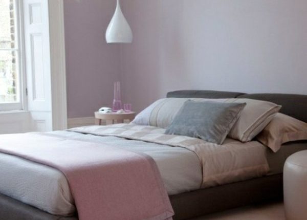 bedroom with purple color-blocked wall fun colors trends interior decor